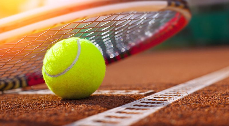 tennis ball and racket