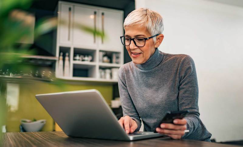 woman working in front of a laptop