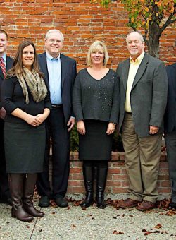 TK CPA group picture outside in front of brick wall