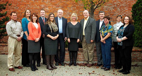 TK CPA group picture outside in front of brick wall