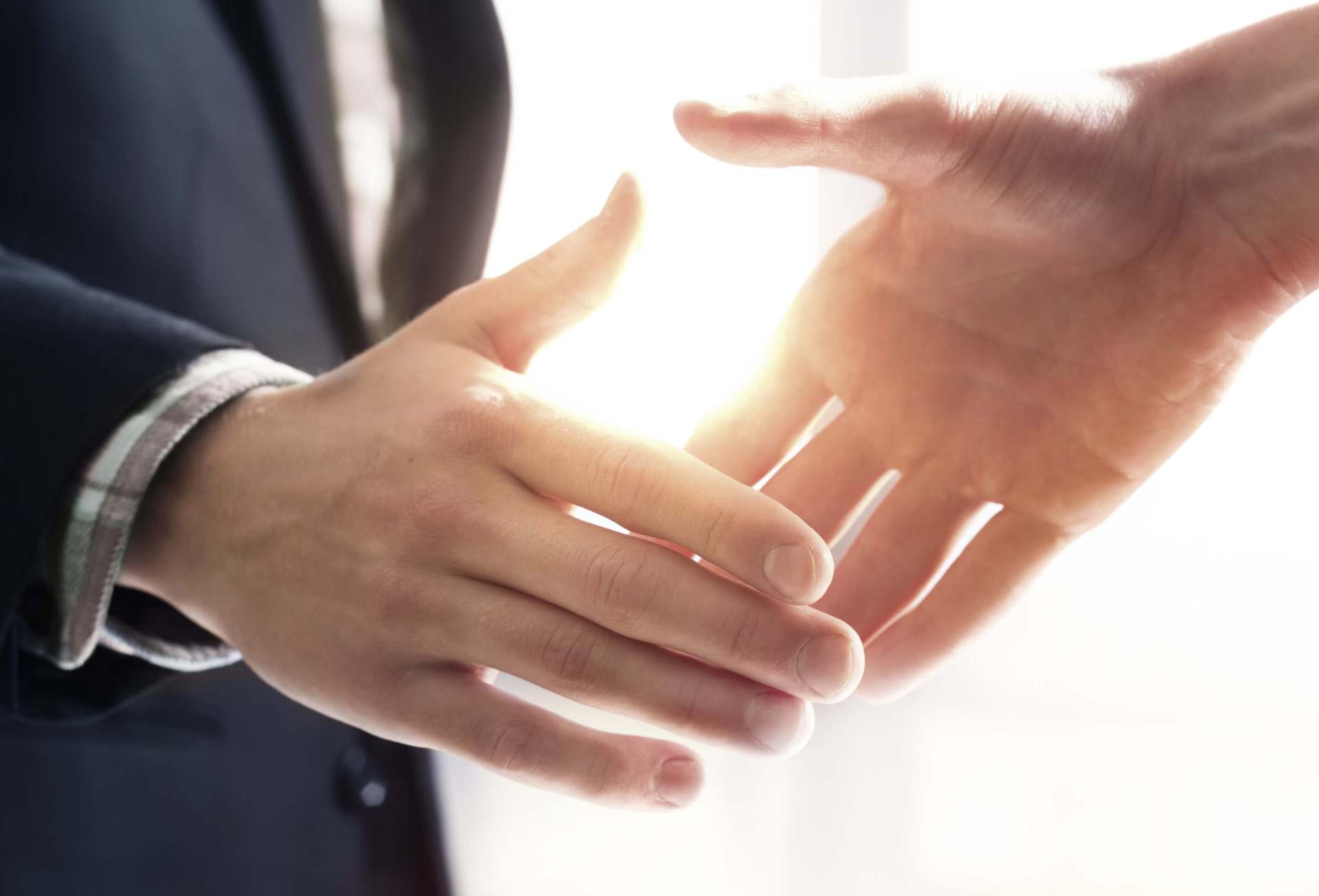 two men shaking hands