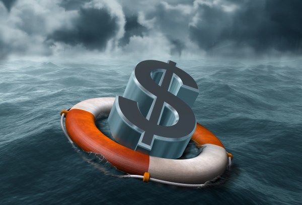 money on a life preserver in the ocean