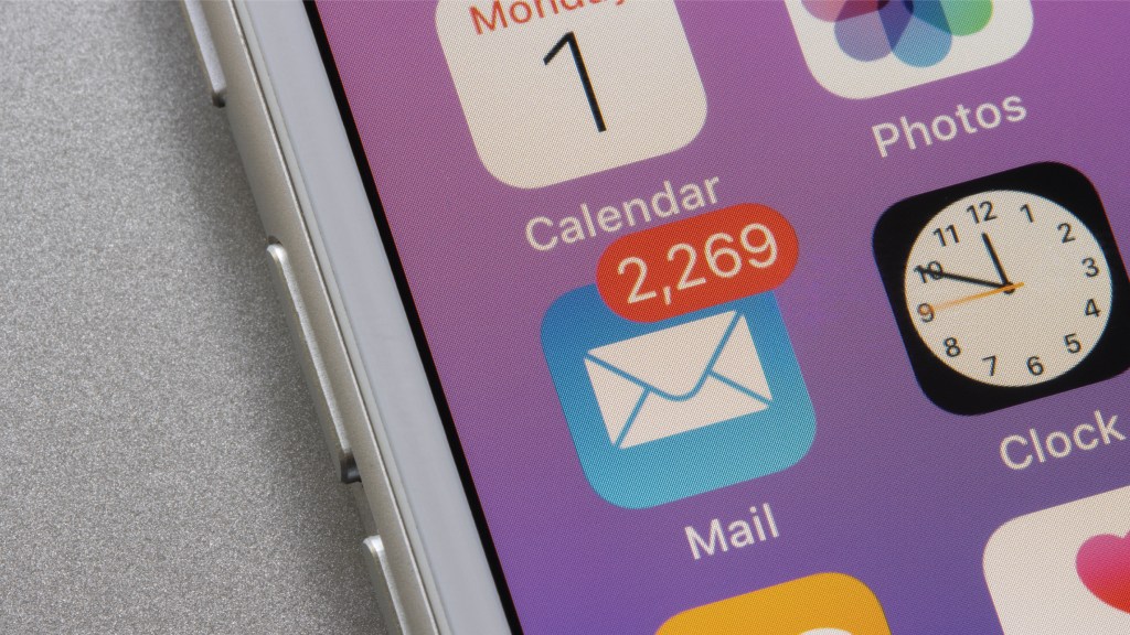 An image of a smartphone with an unread email count of over 2,000, portraying attempts to reach clients going unanswered.